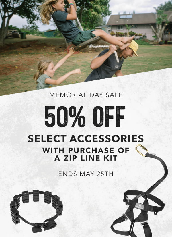 Promotional advertisement for Memorial Day sale on zip line accessories with a family in the background.