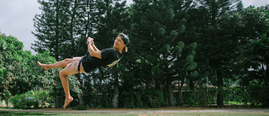 Man riding a zip line